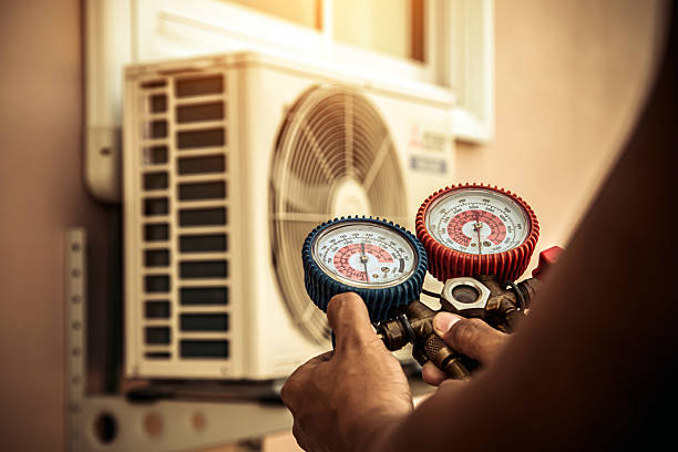 Professional Air Conditioning Service technician working in Rainbow, CA
